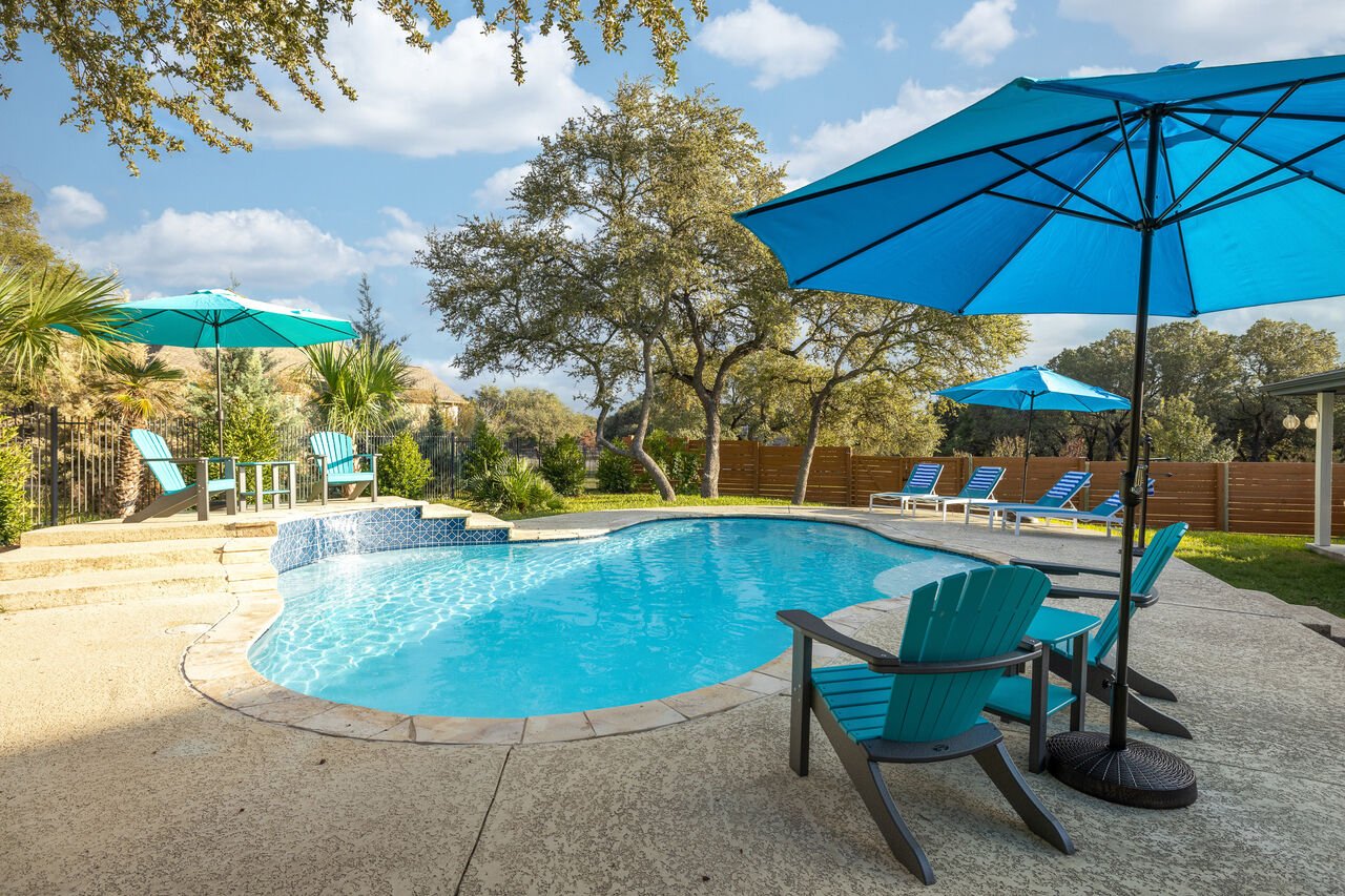 Enjoy the pool at our family vacation rentals in Dripping Springs